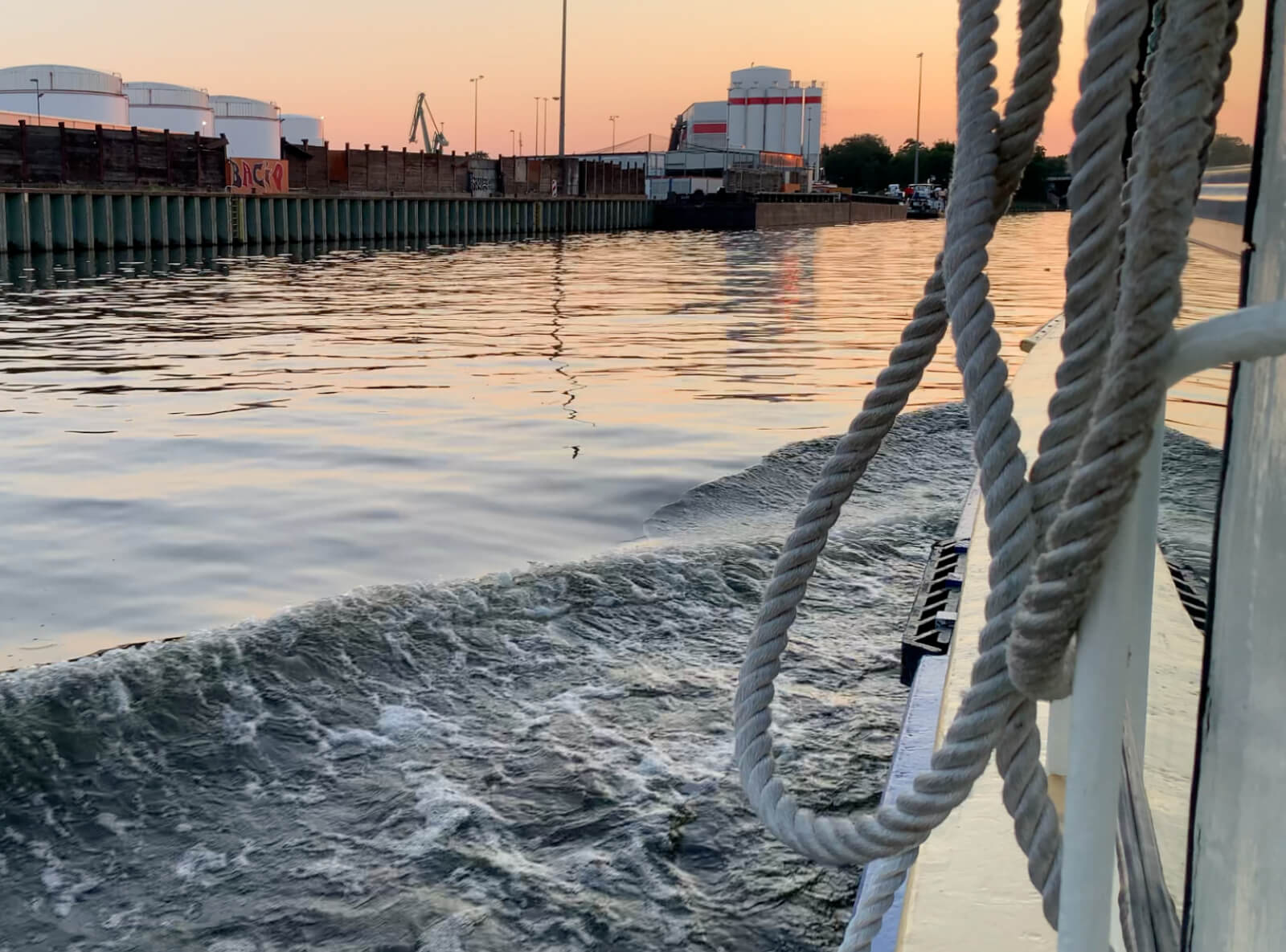 Waiter serving a cocktail for elegant clients in a nice bar