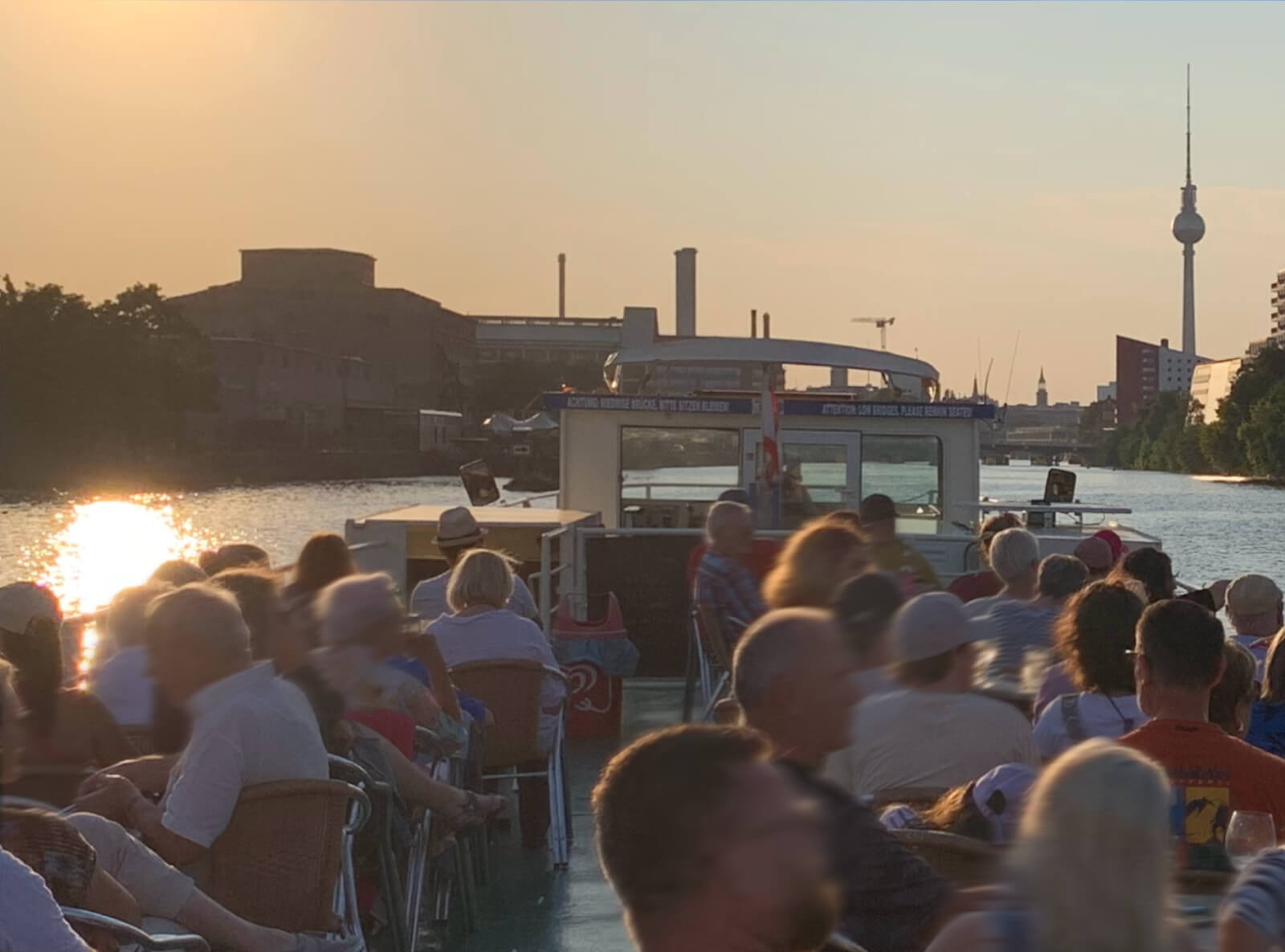 Waiter serving a cocktail for elegant clients in a nice bar